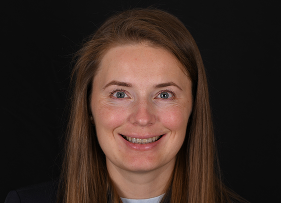 Smiling brunette woman with flawed teeth